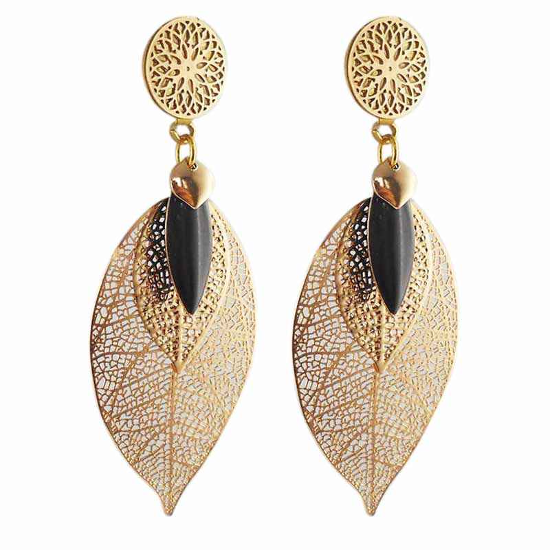 Boucles d'oreilles clip dorées vintage avec fausses perles et
